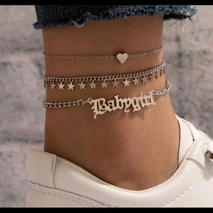 New never used. Three-piece anklets set